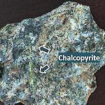 View of chalcopyrite in coarse grained diorite porphyry fragment from the Vanderbilt tunnel dump located near the Georgine pit.